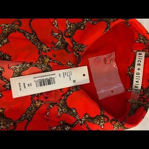 New season just purchased brand new for $295 worn once for photo shoot only